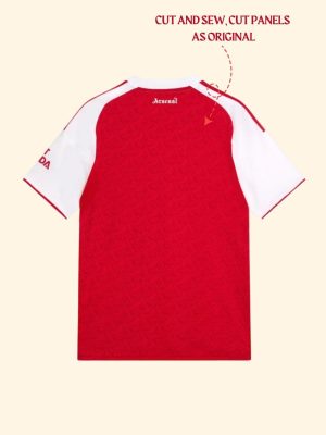 Arsenal 2025-26 jersey flat lay with football and boots
