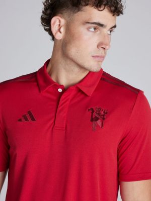 Limited edition red polo with Manchester United crest and Snapdragon logo