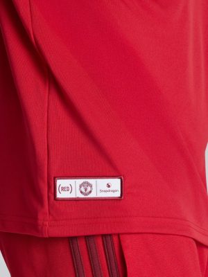 Red limited edition Man Utd polo with Snapdragon sponsor