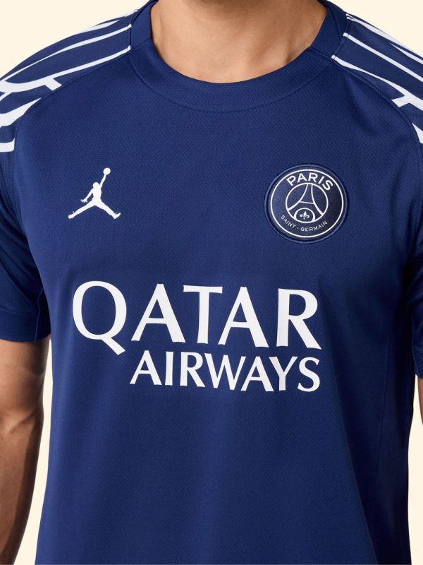 PSG fans wearing the Jordan 4th kit in a street-style photoshoot