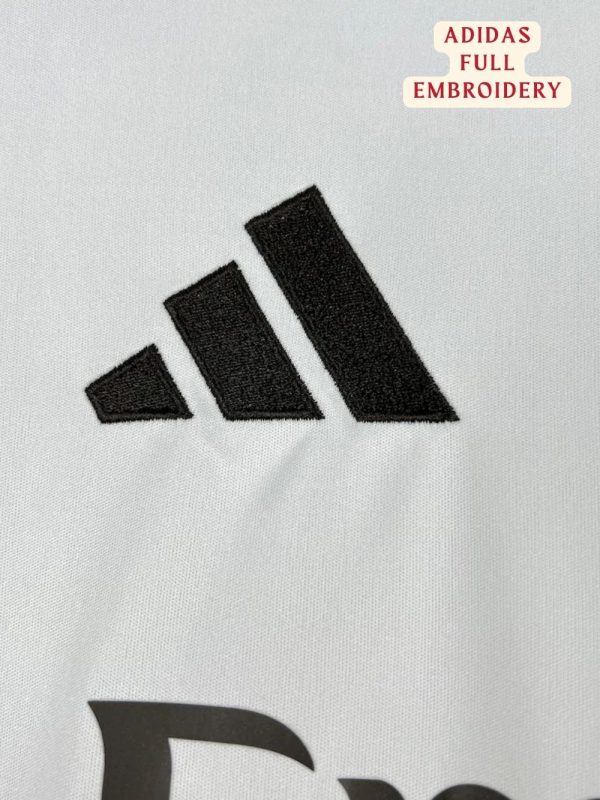 Real Madrid players in the new 25/26 kit celebrating a goal teehub