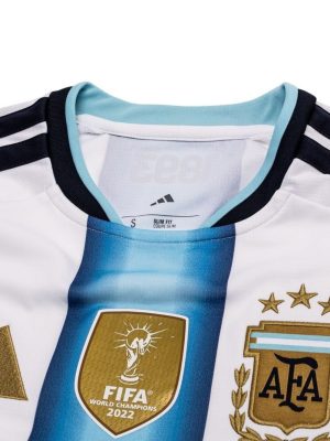 Teehub Argentina World Cup 2026 jersey with stitched AFA badge and sponsor detailing.