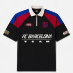 FCB Polo Half Zip Racing Barca oversized polo shirt made from 100% cotton with drop shoulder fit, available only on TeeHub.
